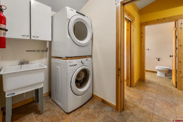 a room with wooden floor and window