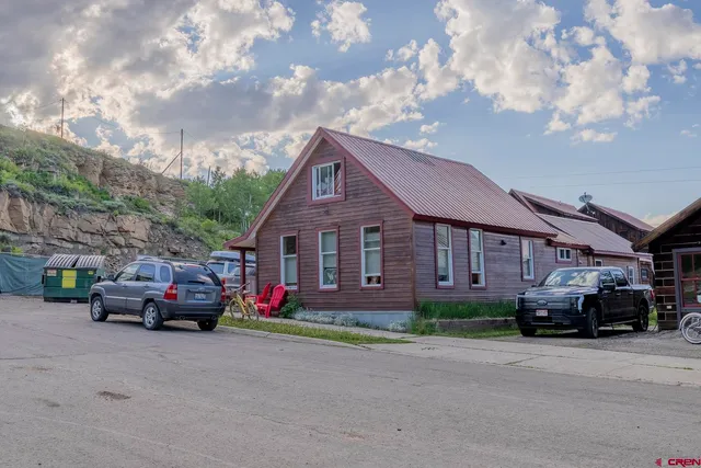 a car parked in front of a house