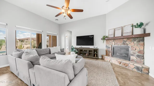 a bedroom with a bed and a potted plant