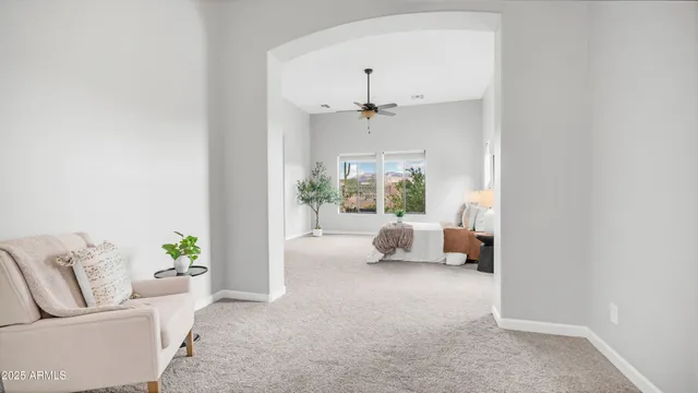 a bathroom with a sink a toilet and shower curtain