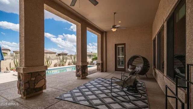an aerial view of a house with garden space and street view