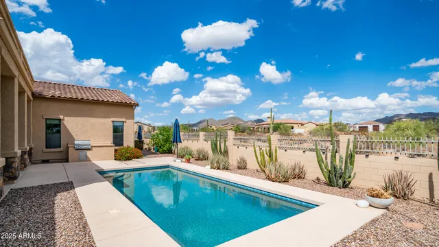 an aerial view of house with yard