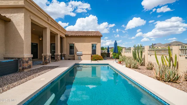 an aerial view of residential house and green space