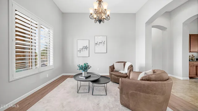 a kitchen with granite countertop a sink and cabinets