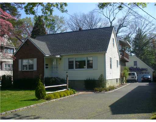 12 Salem Street Cos Cob, CT 06807 - Photo 1 of 5 a view of a house with a yard