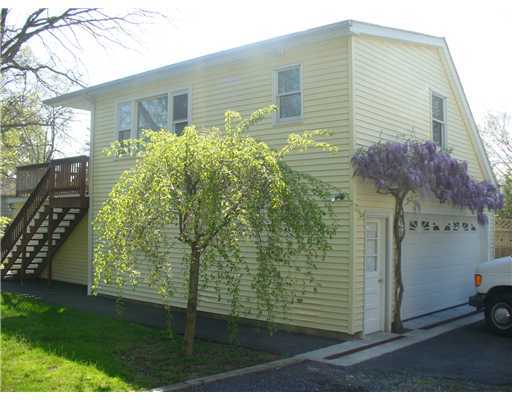 12 Salem Street Cos Cob, CT 06807 - Photo 3 of 5 a view of a house with a yard
