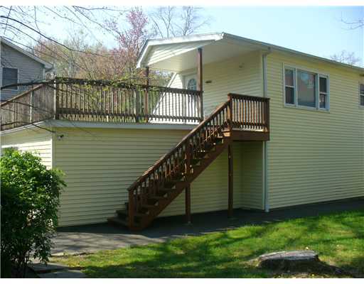 12 Salem Street Cos Cob, CT 06807 - Photo 4 of 5 a view of a house with a yard