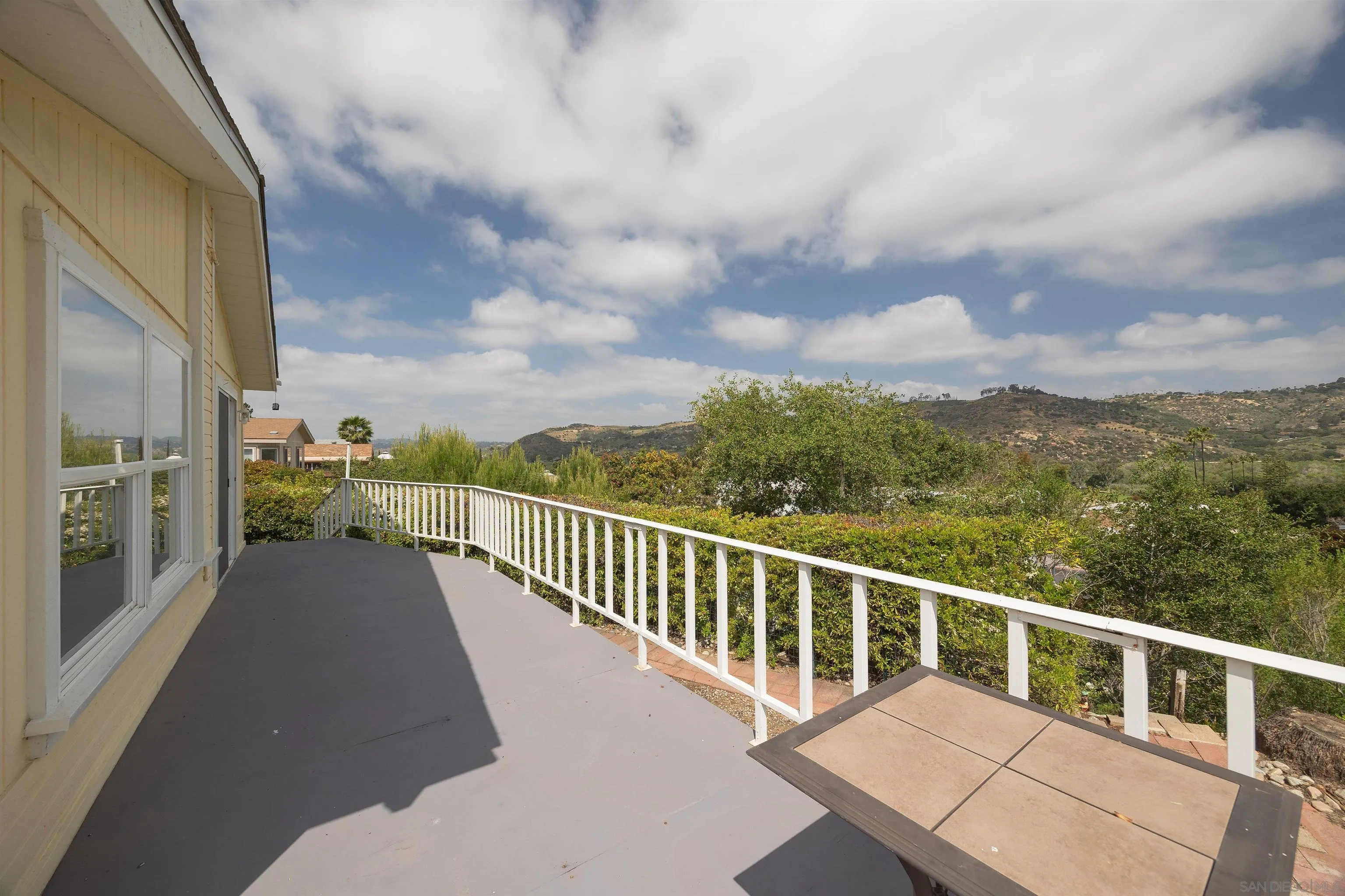 4650 Dulin Road, Unit 162 Fallbrook, CA 92003 - Photo 2 of 36 a view of a balcony with yard