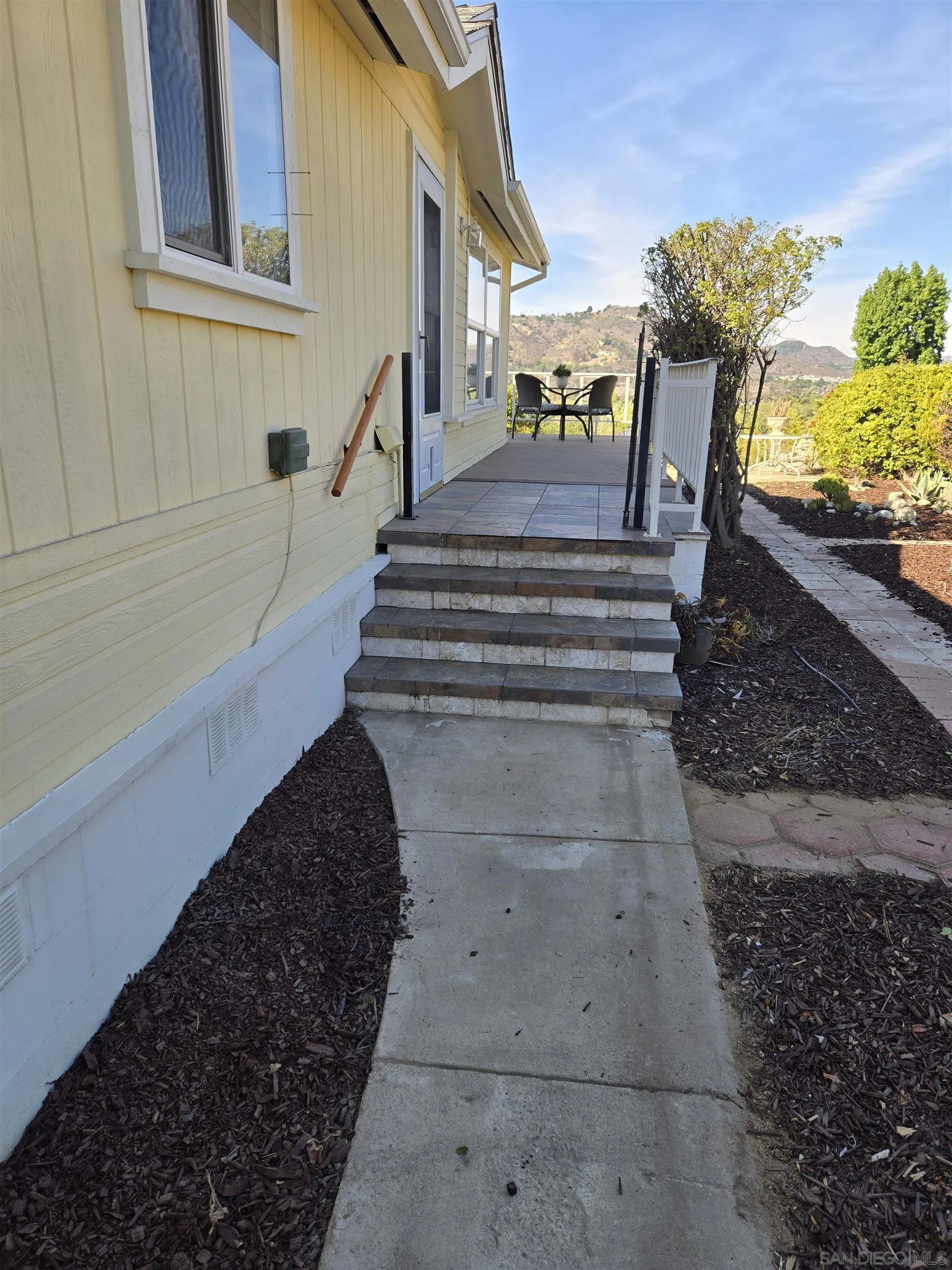 4650 Dulin Road, Unit 162 Fallbrook, CA 92003 - Photo 28 of 36 a view of entryway and hall with wooden floor
