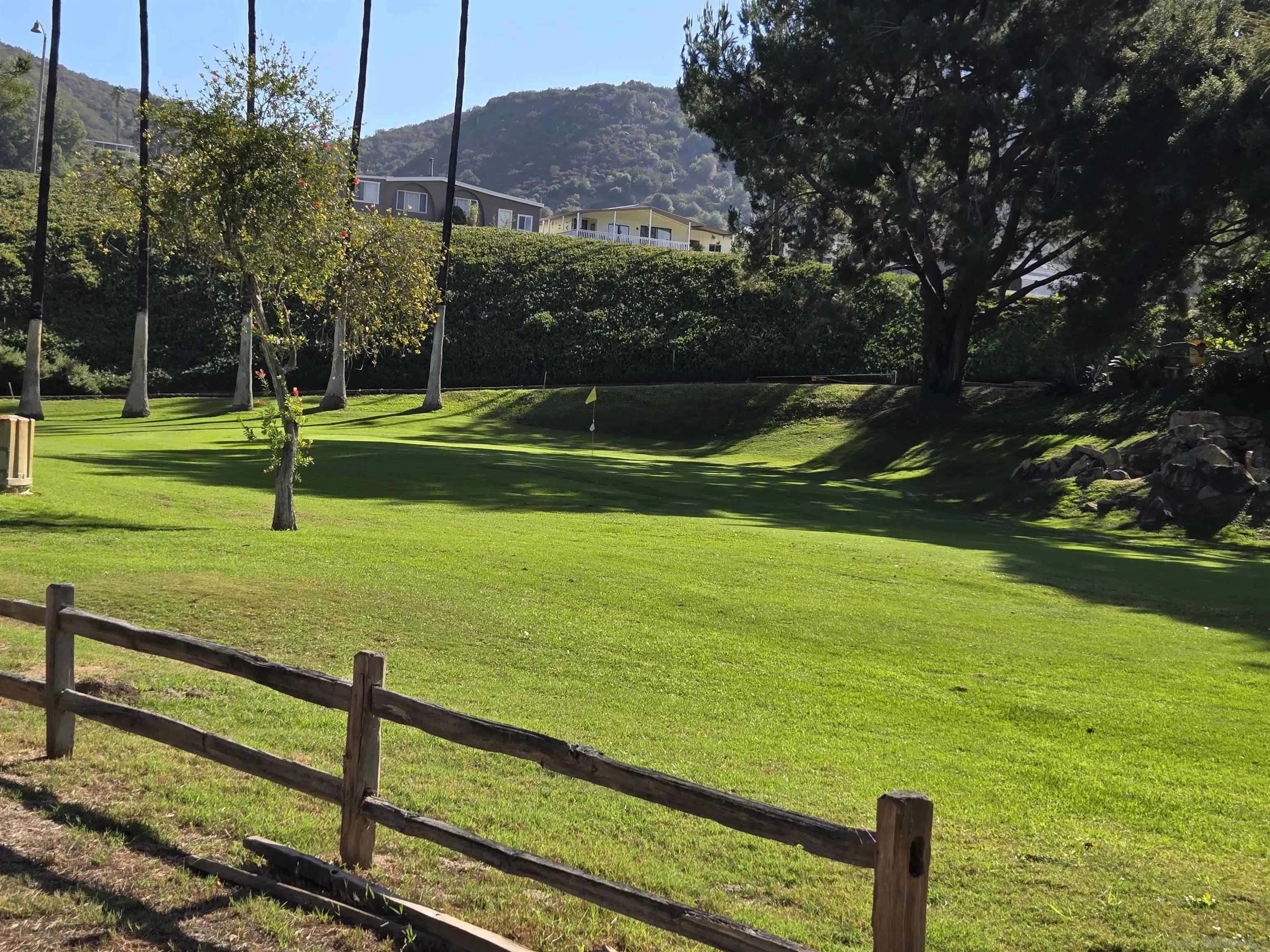 4650 Dulin Road, Unit 162 Fallbrook, CA 92003 - Photo 30 of 36 a view of a park with large trees