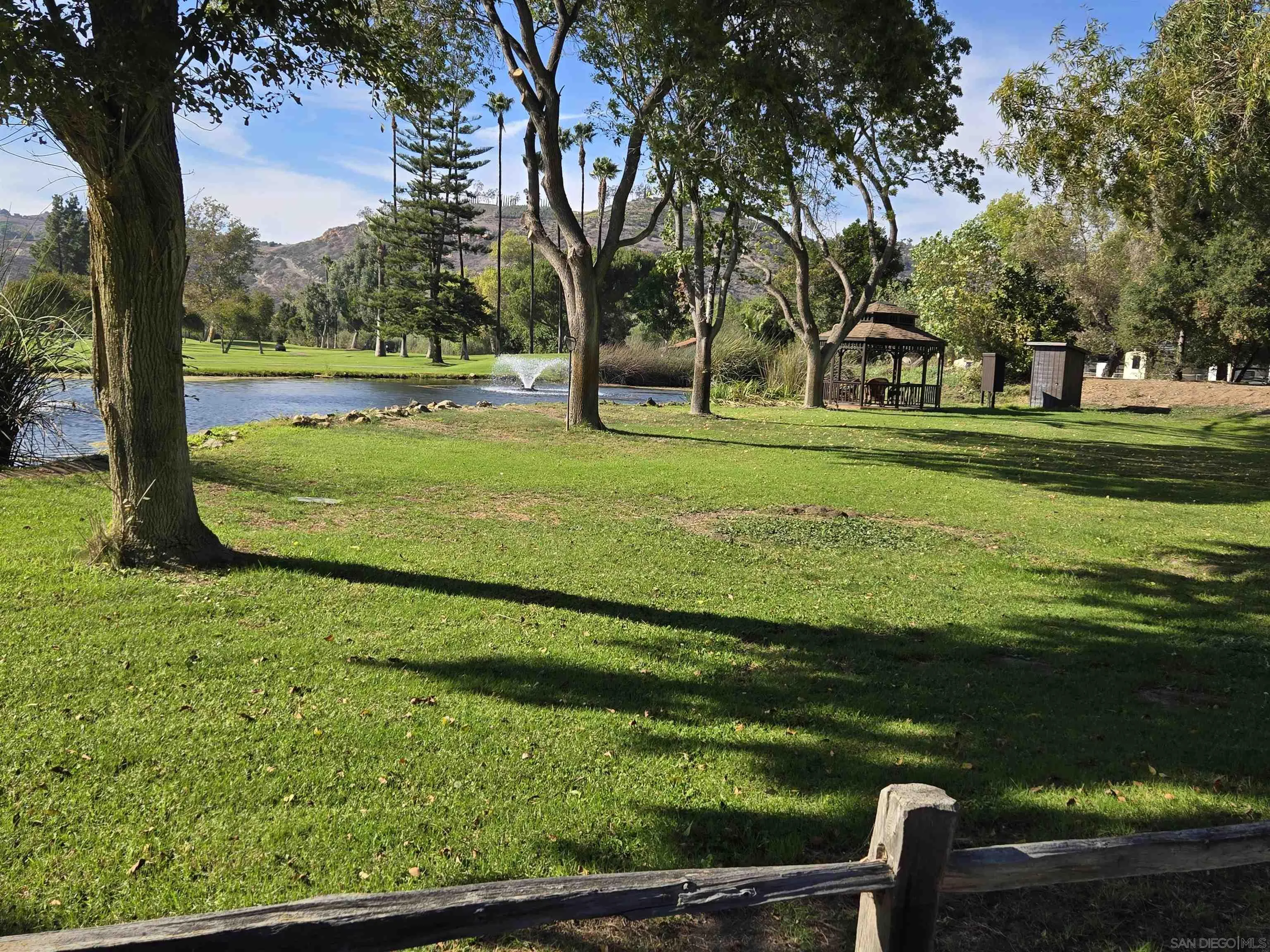 4650 Dulin Road, Unit 162 Fallbrook, CA 92003 - Photo 34 of 36 a view of a park with large trees