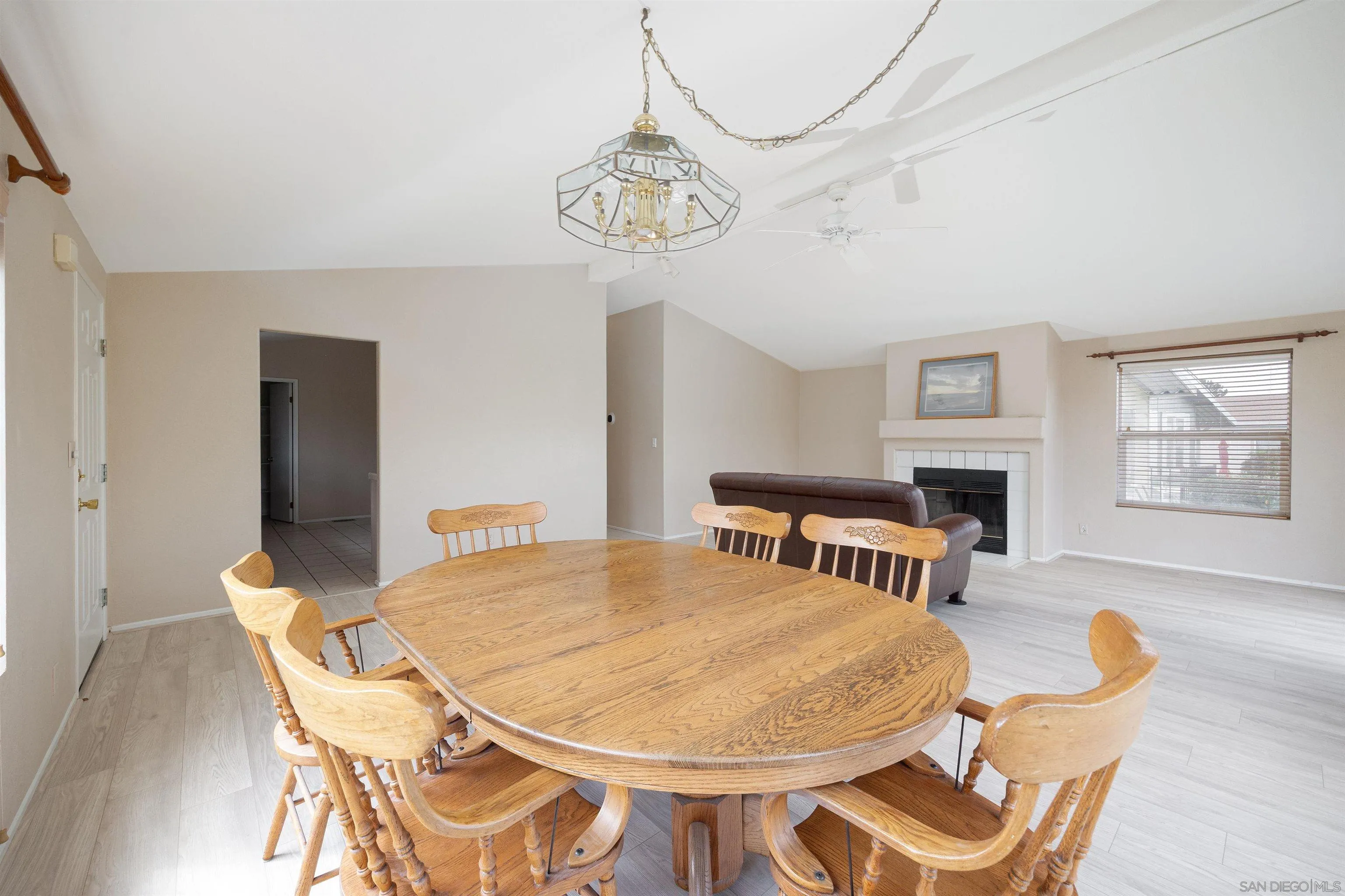 4650 Dulin Road, Unit 162 Fallbrook, CA 92003 - Photo 9 of 36 a view of a dining room with furniture and a chandelier