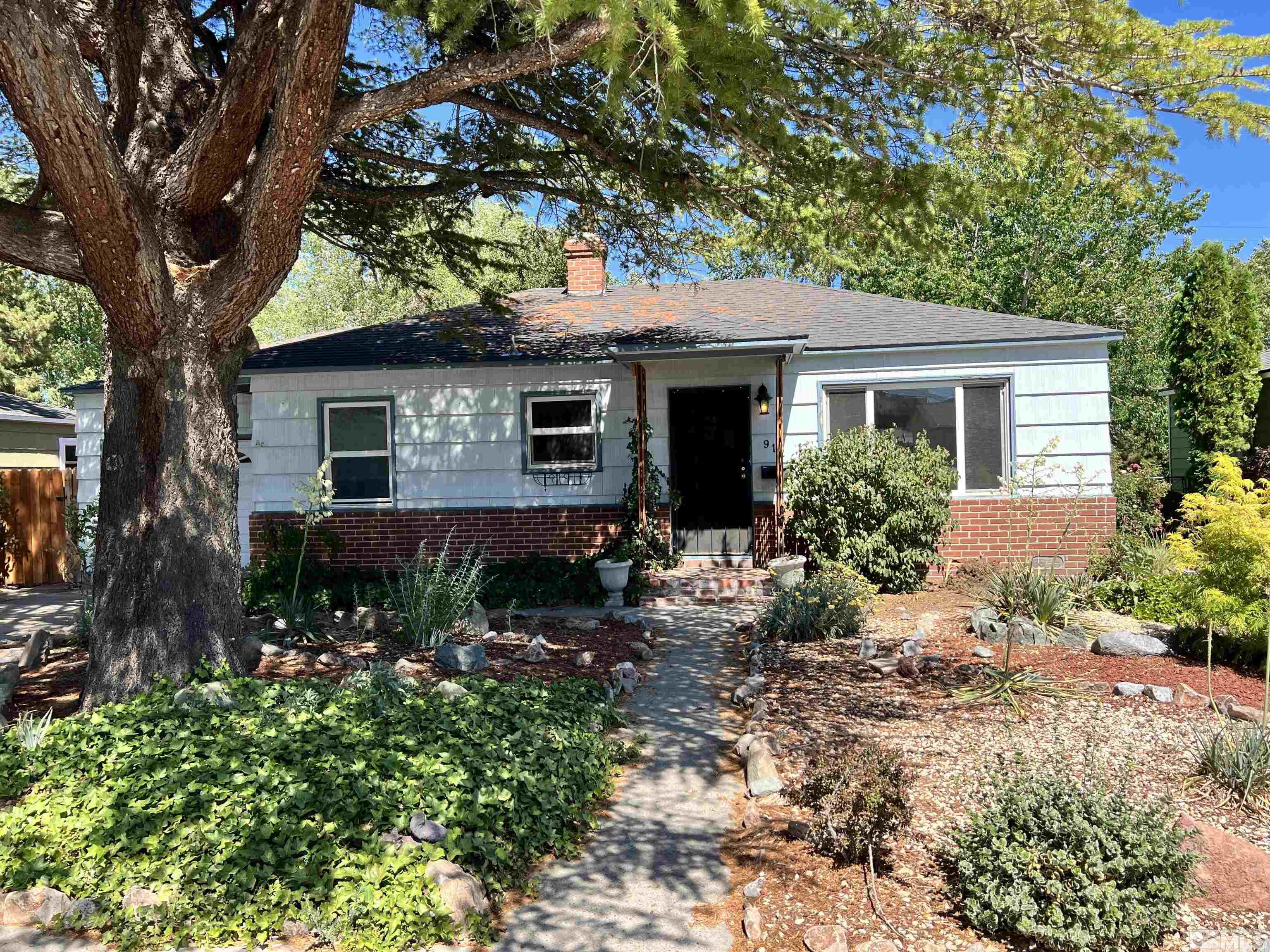 912 Bates Avenue Reno, NV 89502 - Photo 2 of 7 a backyard of a house with seating space