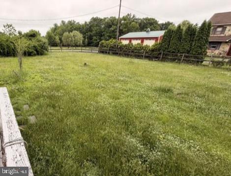 2060 Adams Road East Greenville, PA 18041 - Photo 23 of 32 Lush green expanse with rustic charm.