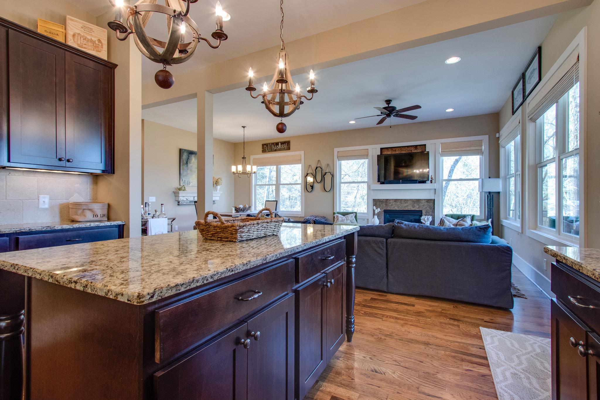 750 Floating Mill Village Road Silver Point, TN 38582 - Photo 11 of 30 a kitchen with a stove center island a cabinets and furniture