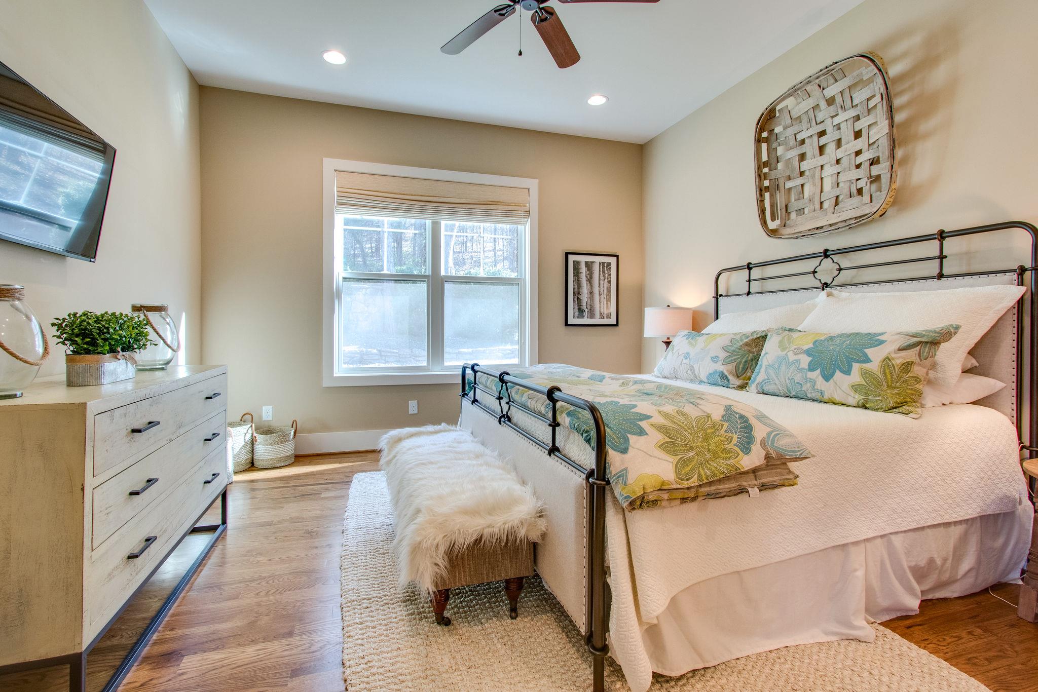 750 Floating Mill Village Road Silver Point, TN 38582 - Photo 13 of 30 a bedroom with furniture and a window