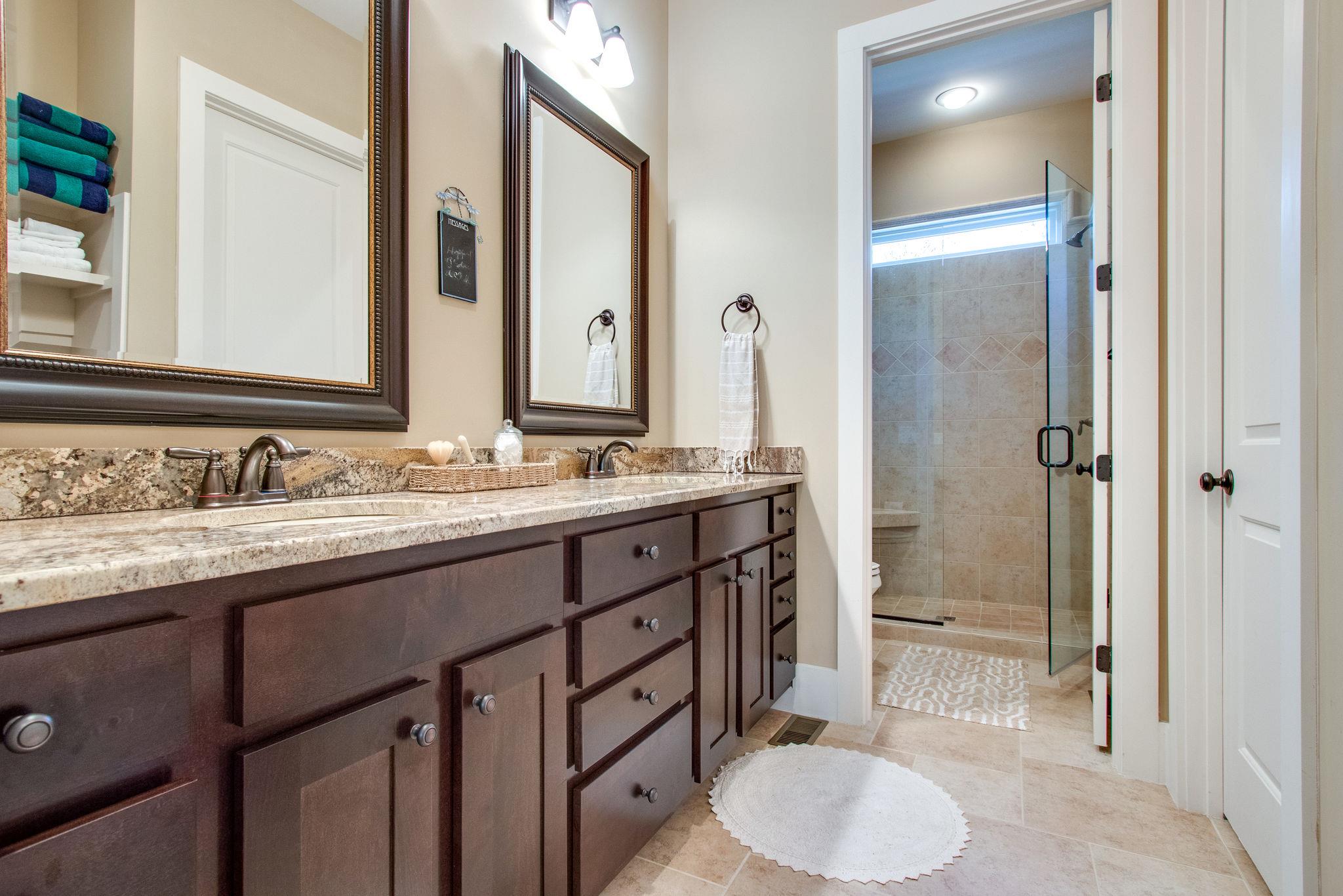 750 Floating Mill Village Road Silver Point, TN 38582 - Photo 14 of 30 a bathroom with a sink a toilet and shower