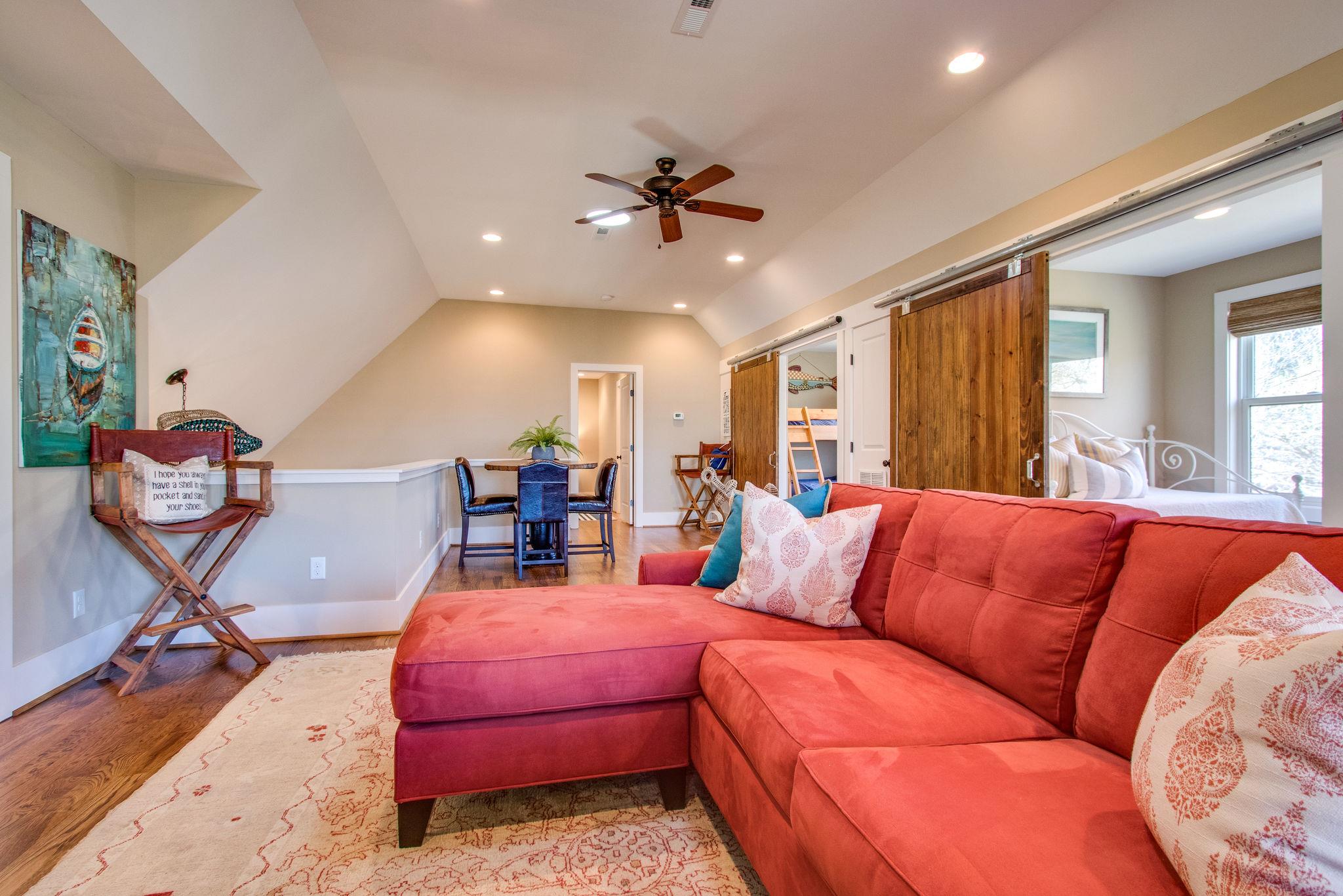 750 Floating Mill Village Road Silver Point, TN 38582 - Photo 17 of 30 a living room with furniture kitchen view and a chandelier