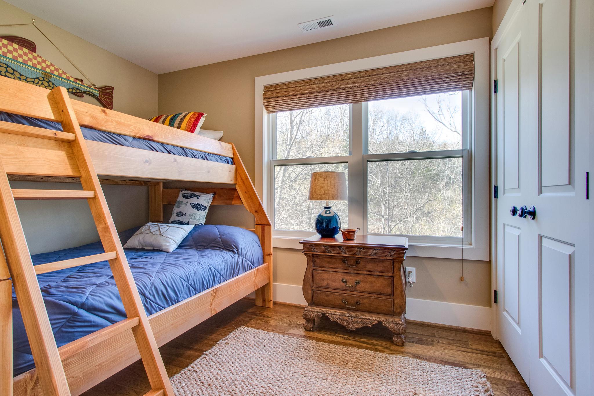 750 Floating Mill Village Road Silver Point, TN 38582 - Photo 20 of 30 a bedroom with furniture and a window