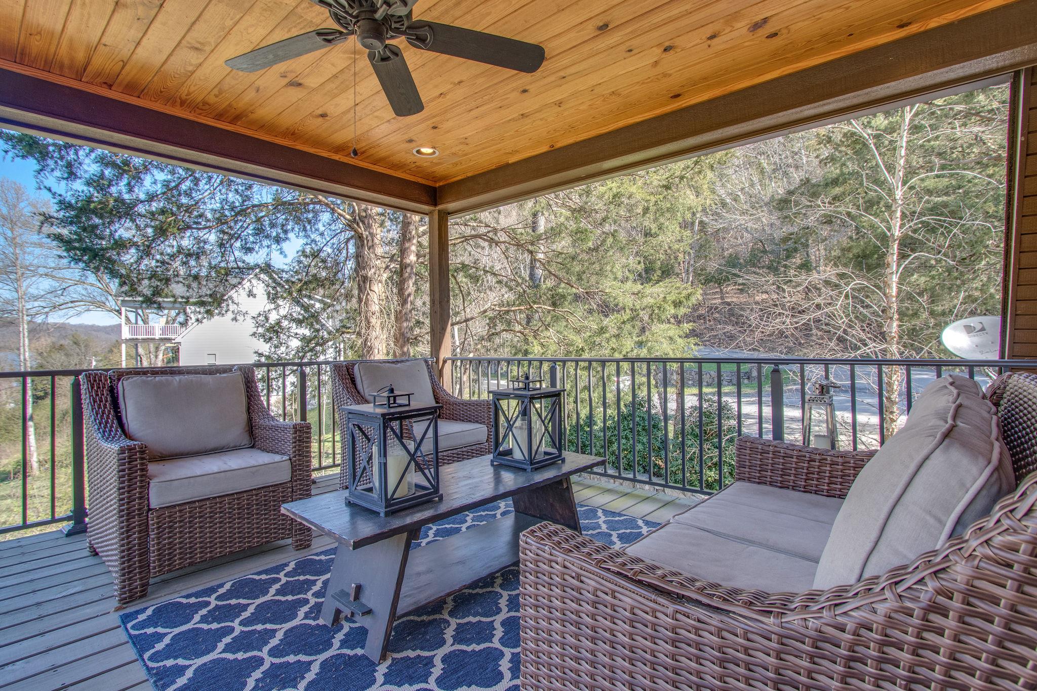 750 Floating Mill Village Road Silver Point, TN 38582 - Photo 23 of 30 a outdoor living space with patio furniture and a potted plant