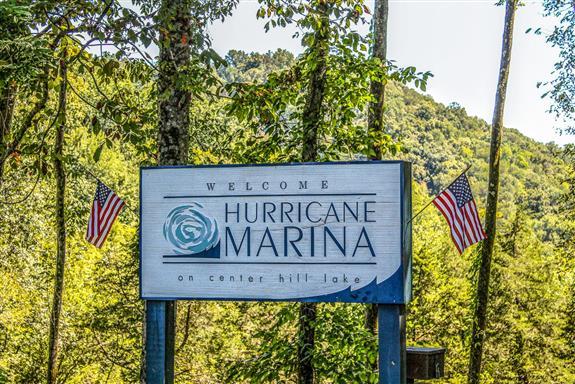750 Floating Mill Village Road Silver Point, TN 38582 - Photo 27 of 30 a sign board with a tree
