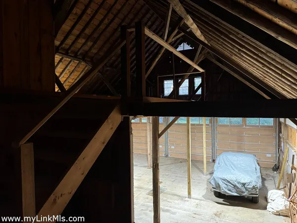 a view of a hallway with windows