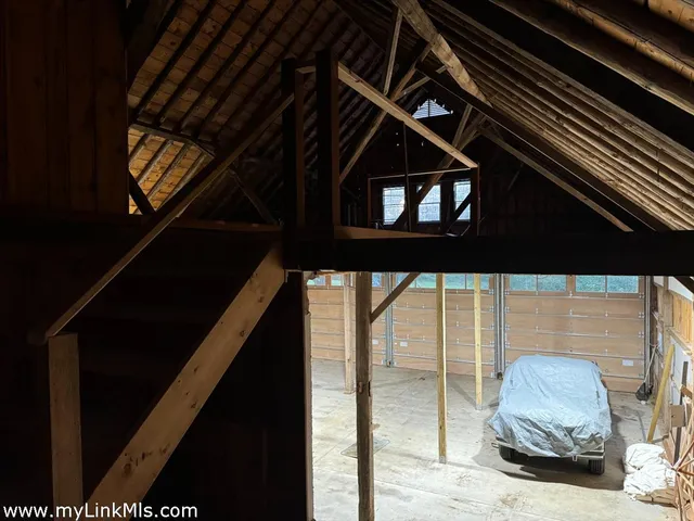 a view of a hallway with windows