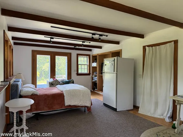 a view of livingroom with furniture and stairs