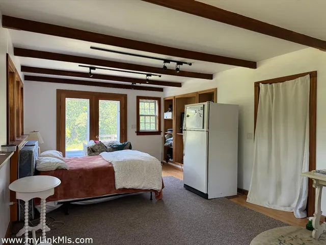 a view of livingroom with furniture and stairs