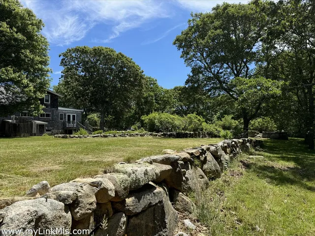 a view of a golf course with a lake