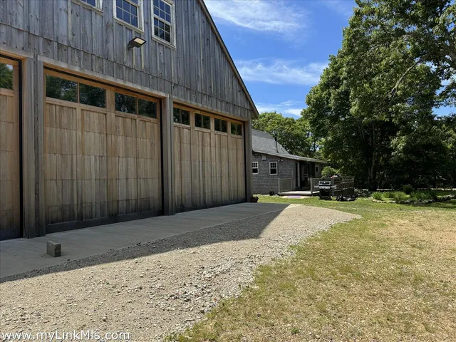 a view of a backyard of the house