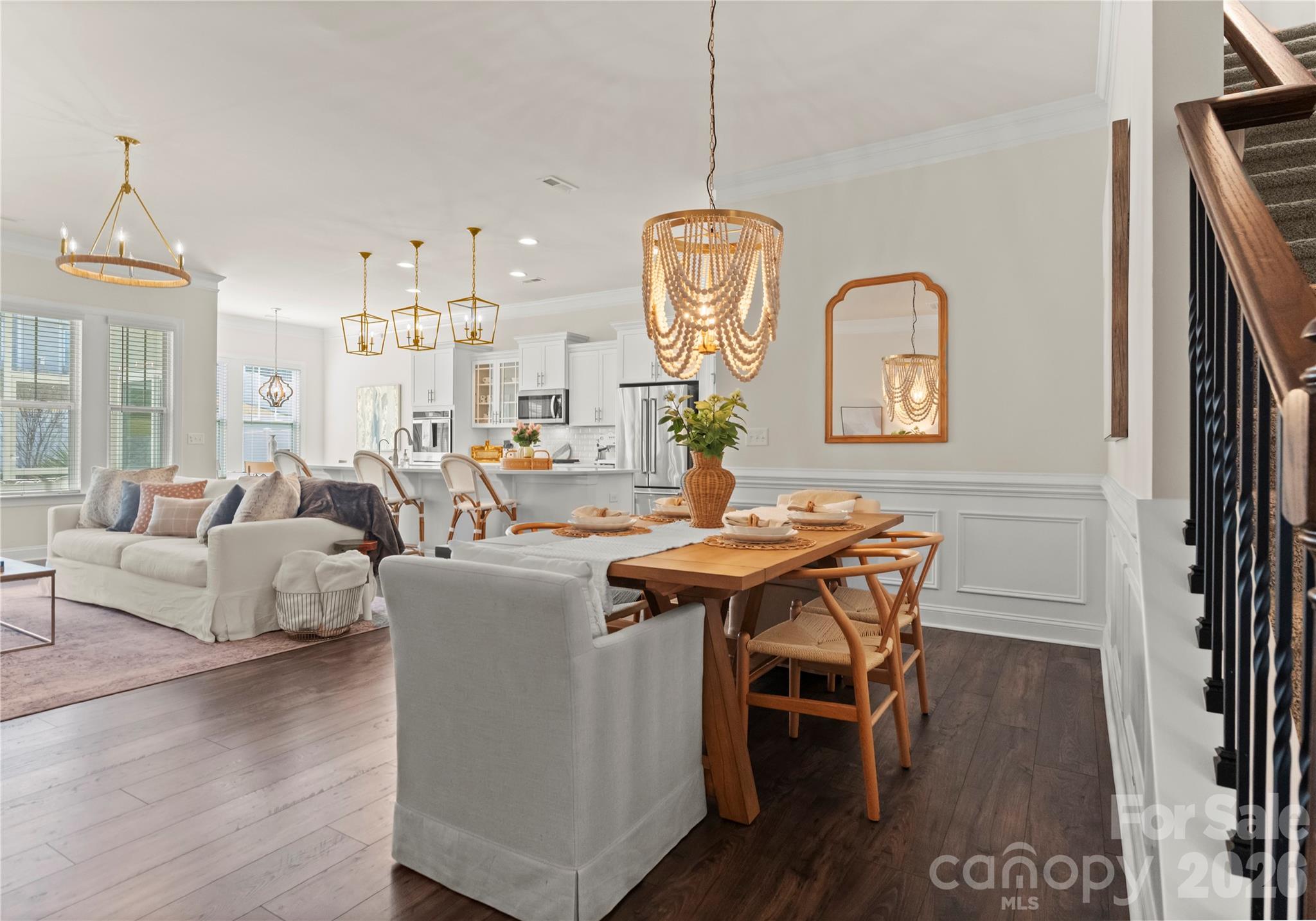 349 Preston Road Mooresville, NC 28117 - Photo 14 of 48 a view of a dining room with furniture window and wooden floor