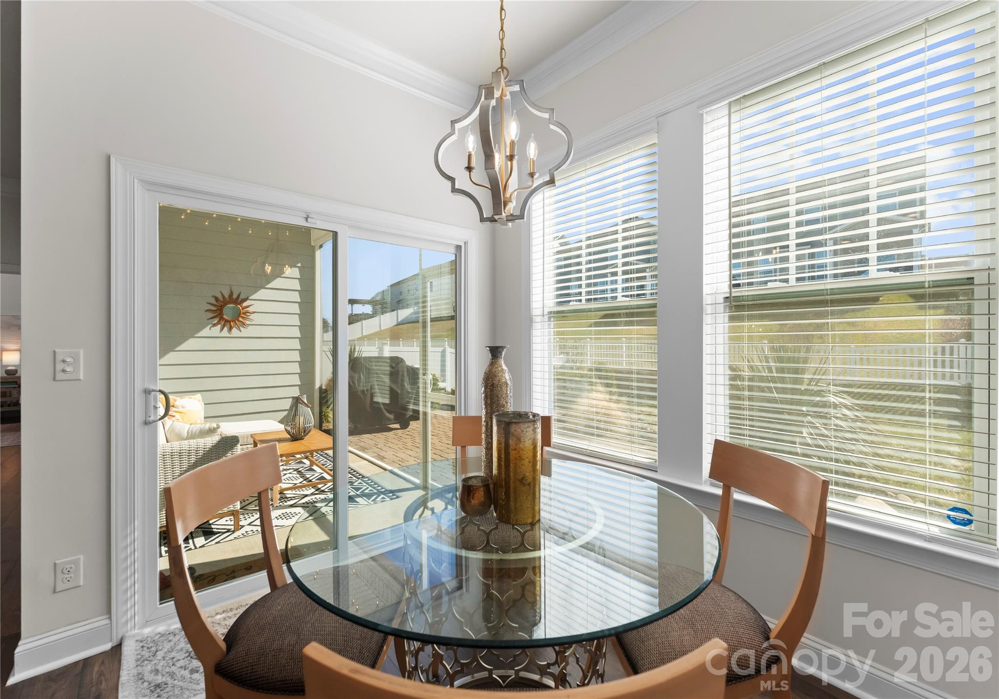349 Preston Road Mooresville, NC 28117 - Photo 16 of 48 a view of a dining room with furniture window and wooden floor