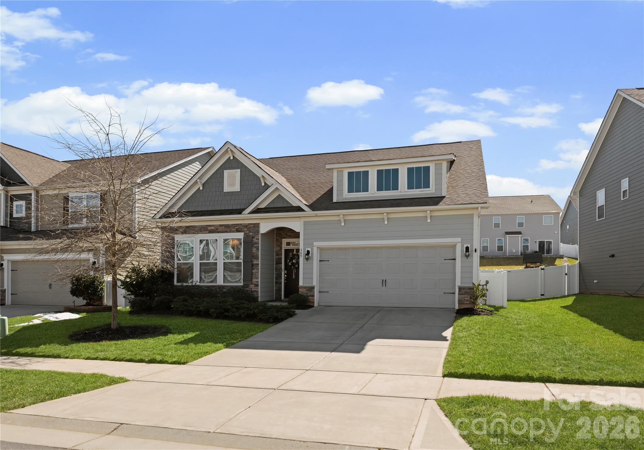 349 Preston Road Mooresville, NC 28117 - Photo 2 of 48 a front view of a house with a garden