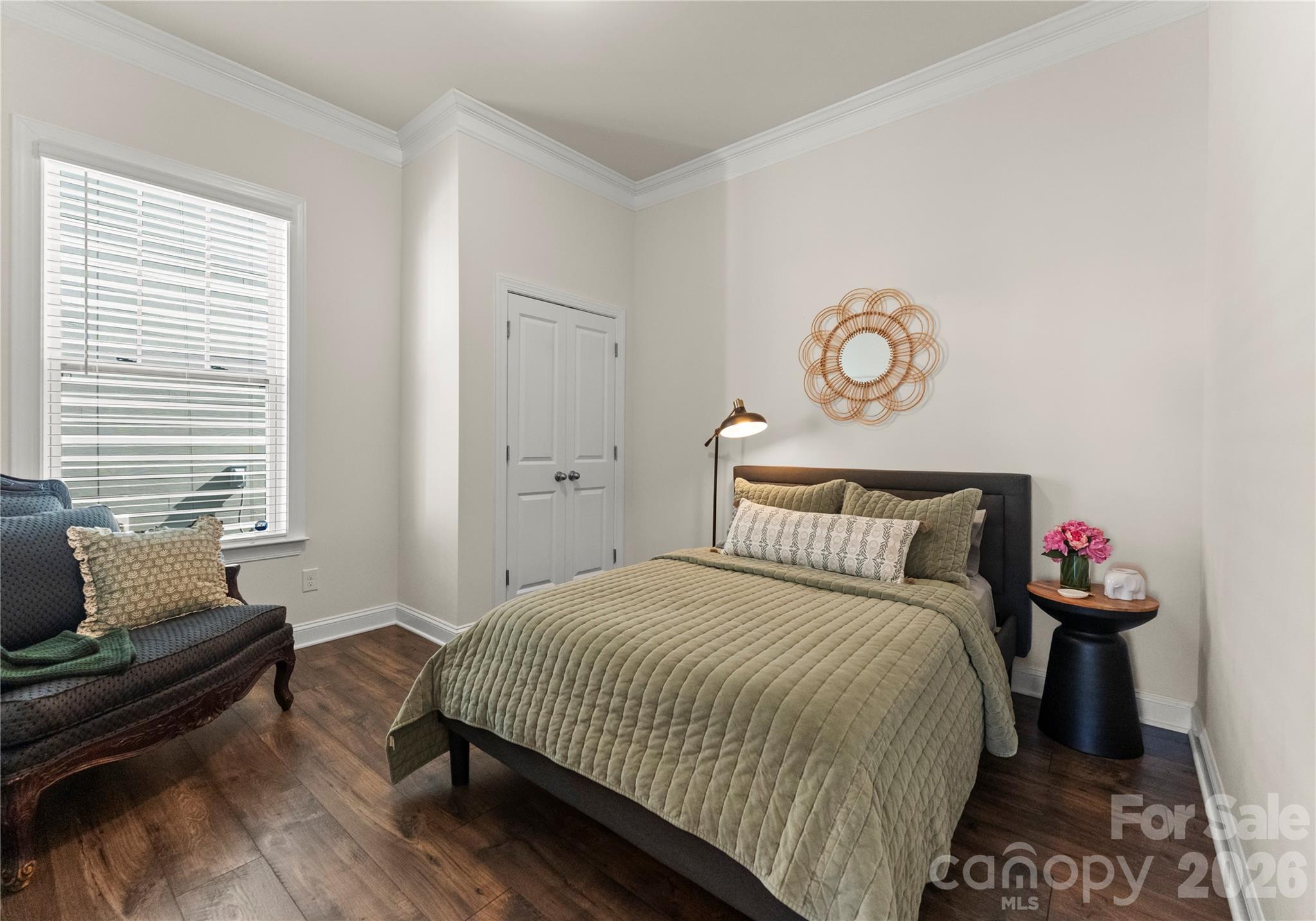 349 Preston Road Mooresville, NC 28117 - Photo 23 of 48 a bedroom with a bed and a chair