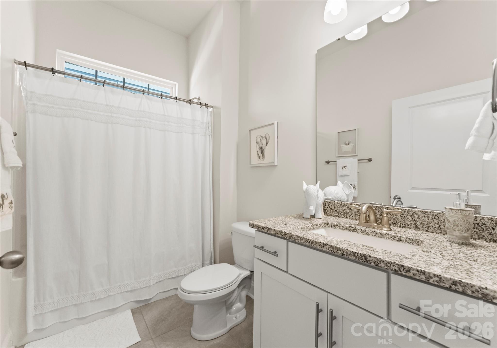 349 Preston Road Mooresville, NC 28117 - Photo 24 of 48 a bathroom with a granite countertop sink toilet and shower