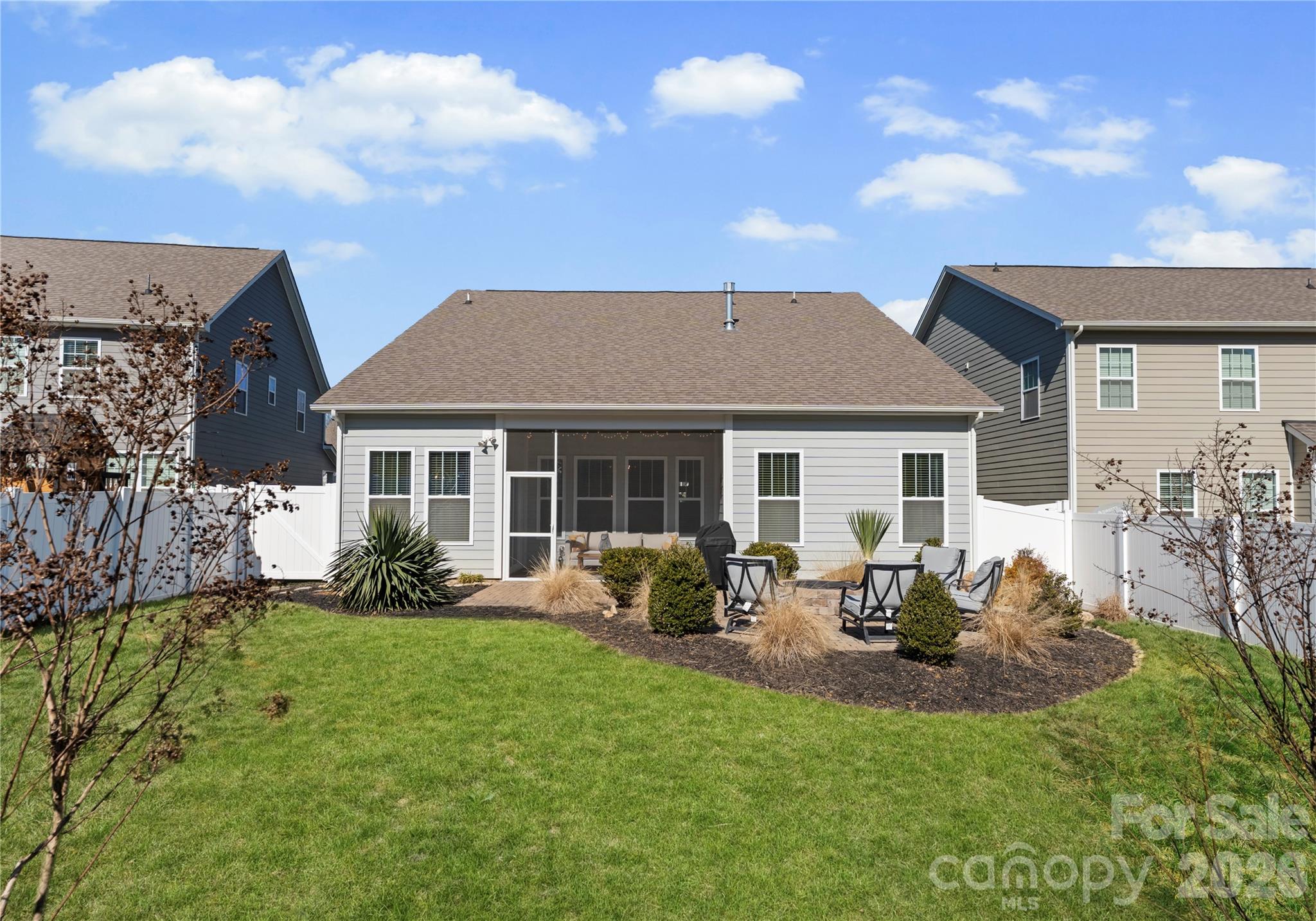 349 Preston Road Mooresville, NC 28117 - Photo 41 of 48 a front view of a house with a garden and patio