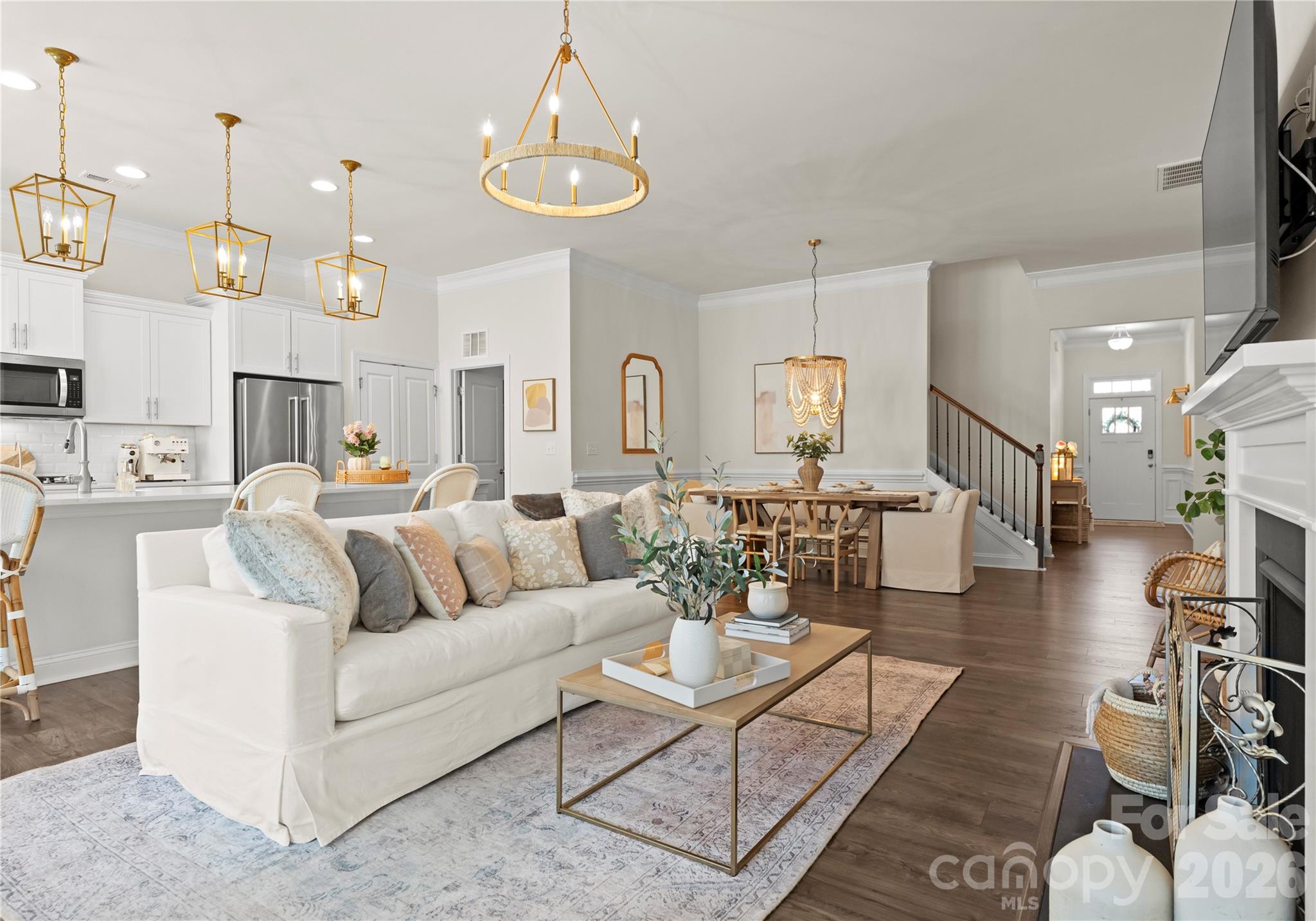 349 Preston Road Mooresville, NC 28117 - Photo 6 of 48 a living room with furniture kitchen view and a chandelier
