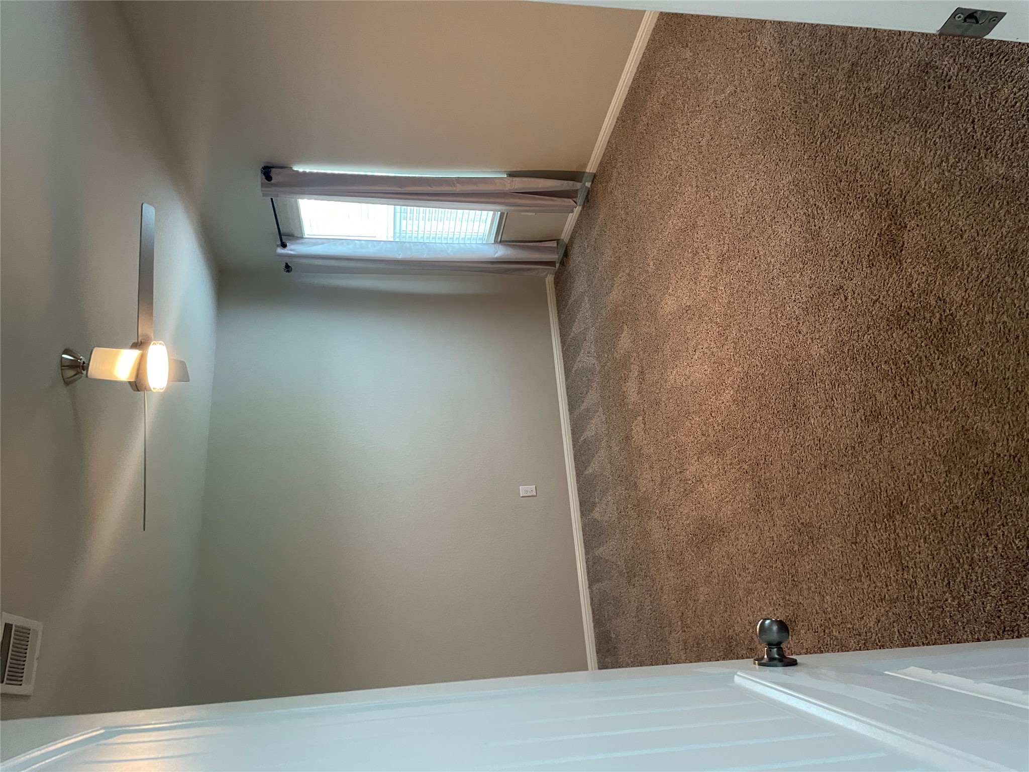 317 Bremen Street Georgetown, TX 78626 - Photo 4 of 19 an empty room with chandelier fan and windows