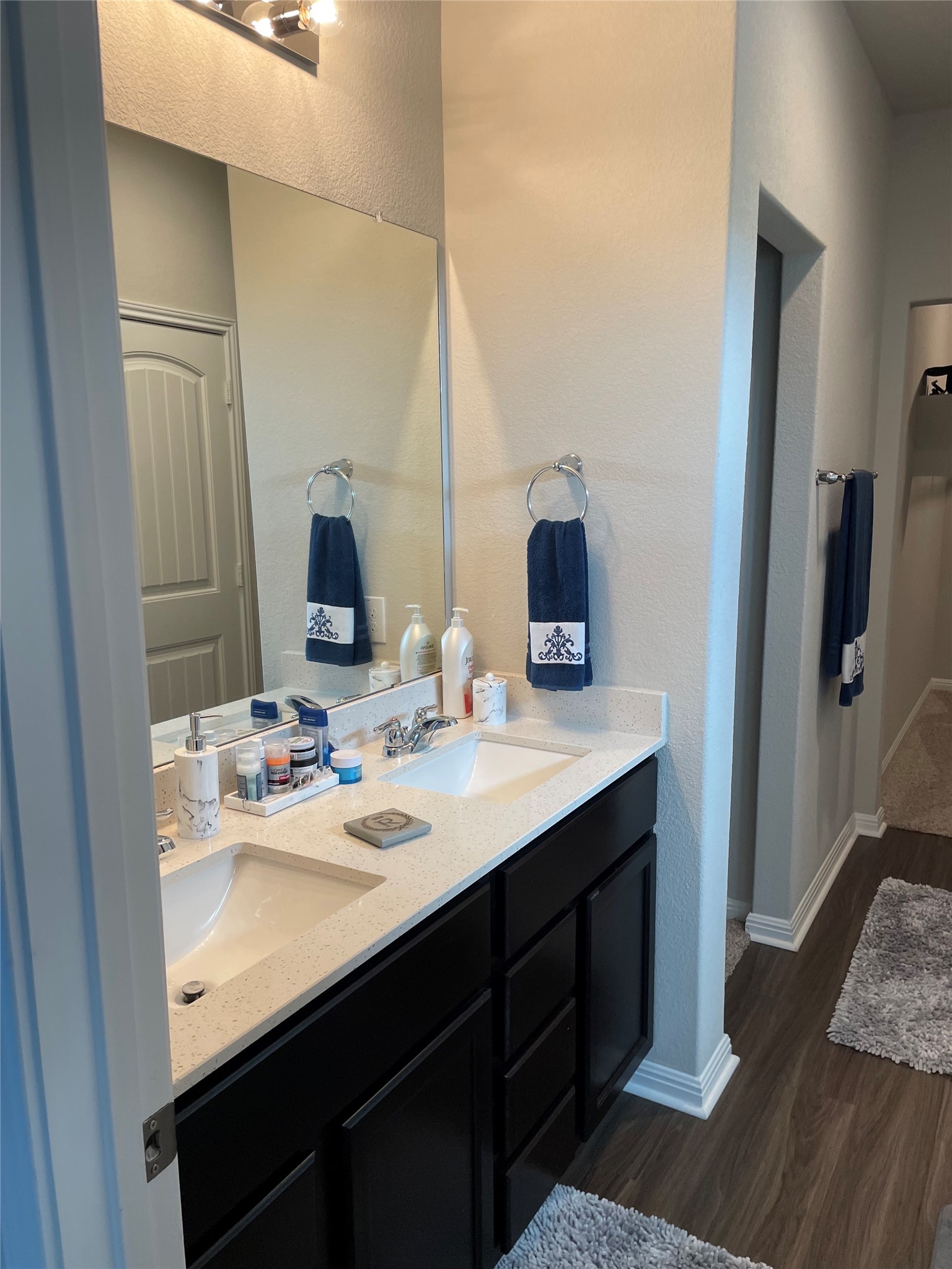 317 Bremen Street Georgetown, TX 78626 - Photo 5 of 19 a bathroom with a sink double vanity granite and a mirror