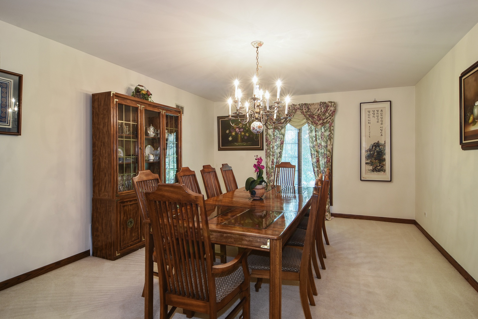 593 Scots Court Inverness, IL 60067 - Photo 9 of 15 a view of a dining room with furniture and chandelier