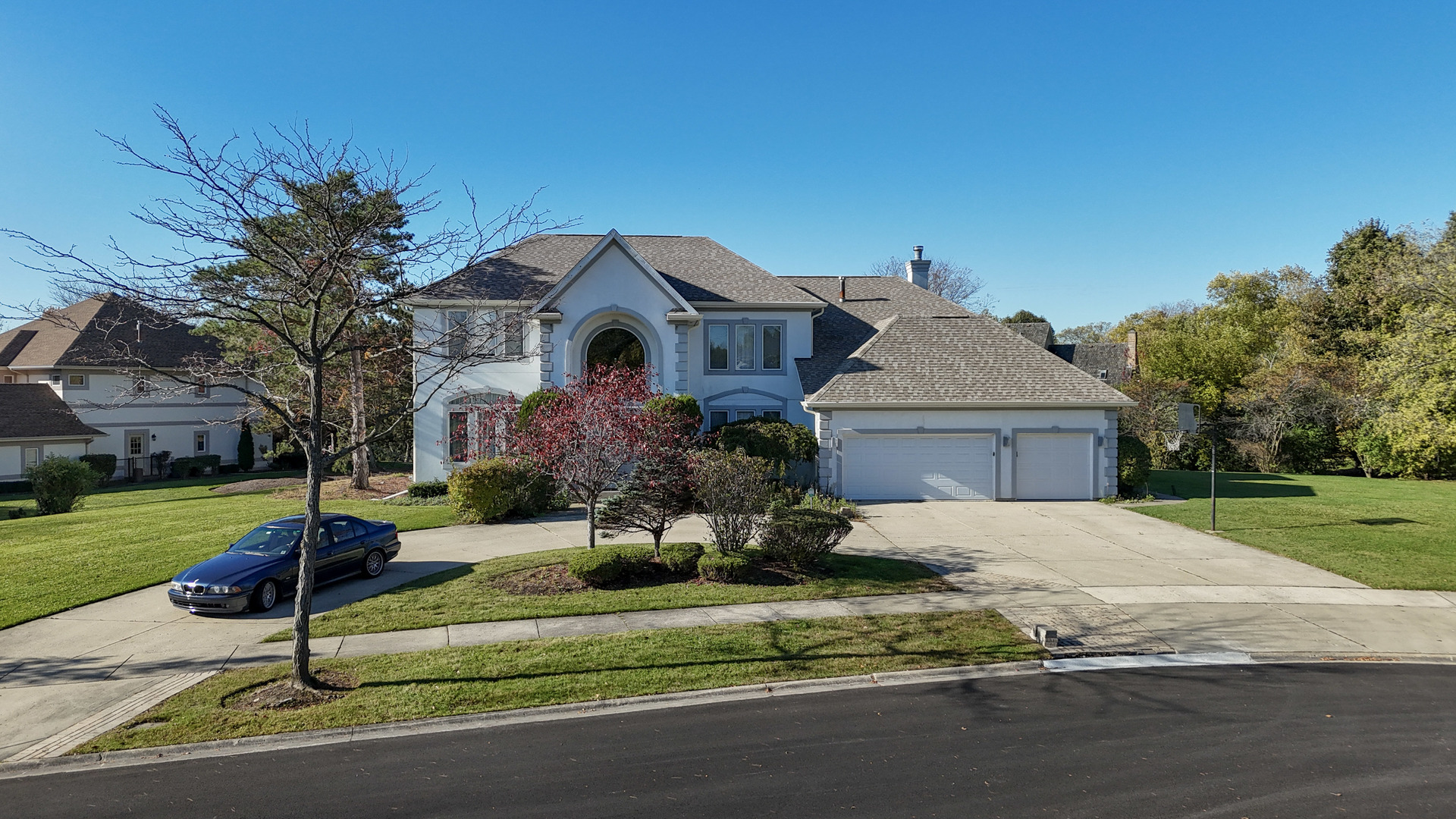 2015 Tree Farm Court Buffalo Grove, IL 60089 - Photo 1 of 100 a front view of a house with a yard