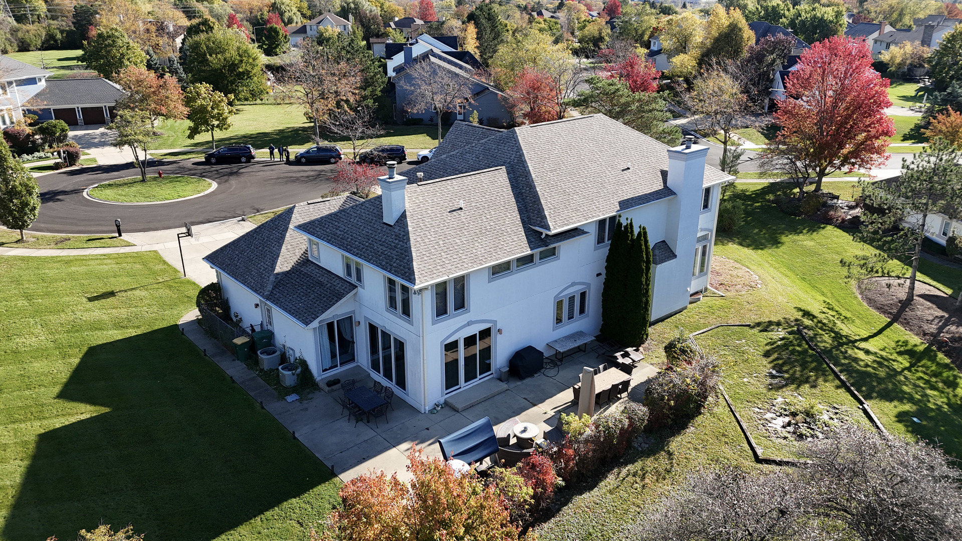 2015 Tree Farm Court Buffalo Grove, IL 60089 - Photo 21 of 100 an aerial view of a house with a yard pool patio and outdoor seating