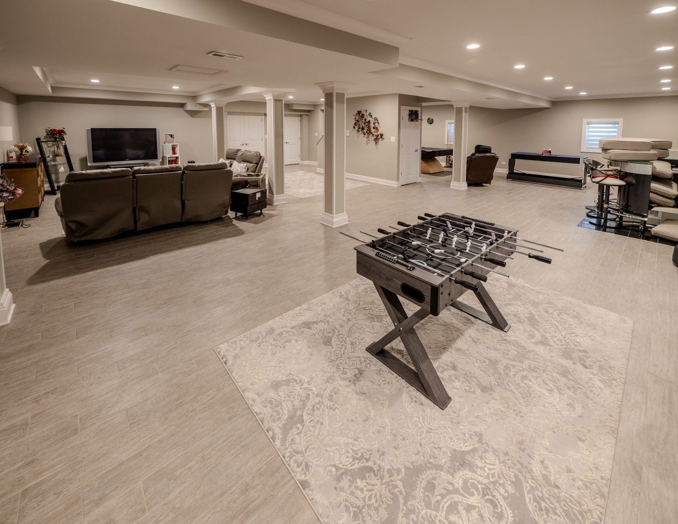2015 Tree Farm Court Buffalo Grove, IL 60089 - Photo 35 of 100 a living room with furniture and a flat screen tv
