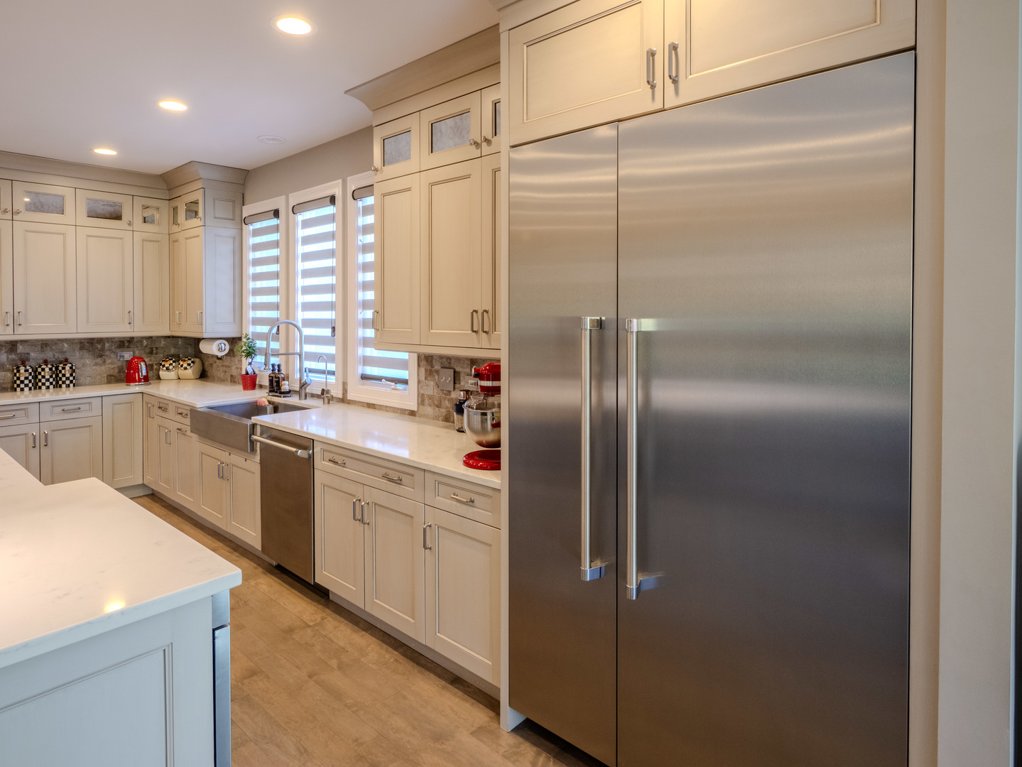 2015 Tree Farm Court Buffalo Grove, IL 60089 - Photo 59 of 100 a kitchen with a refrigerator a sink and cabinets