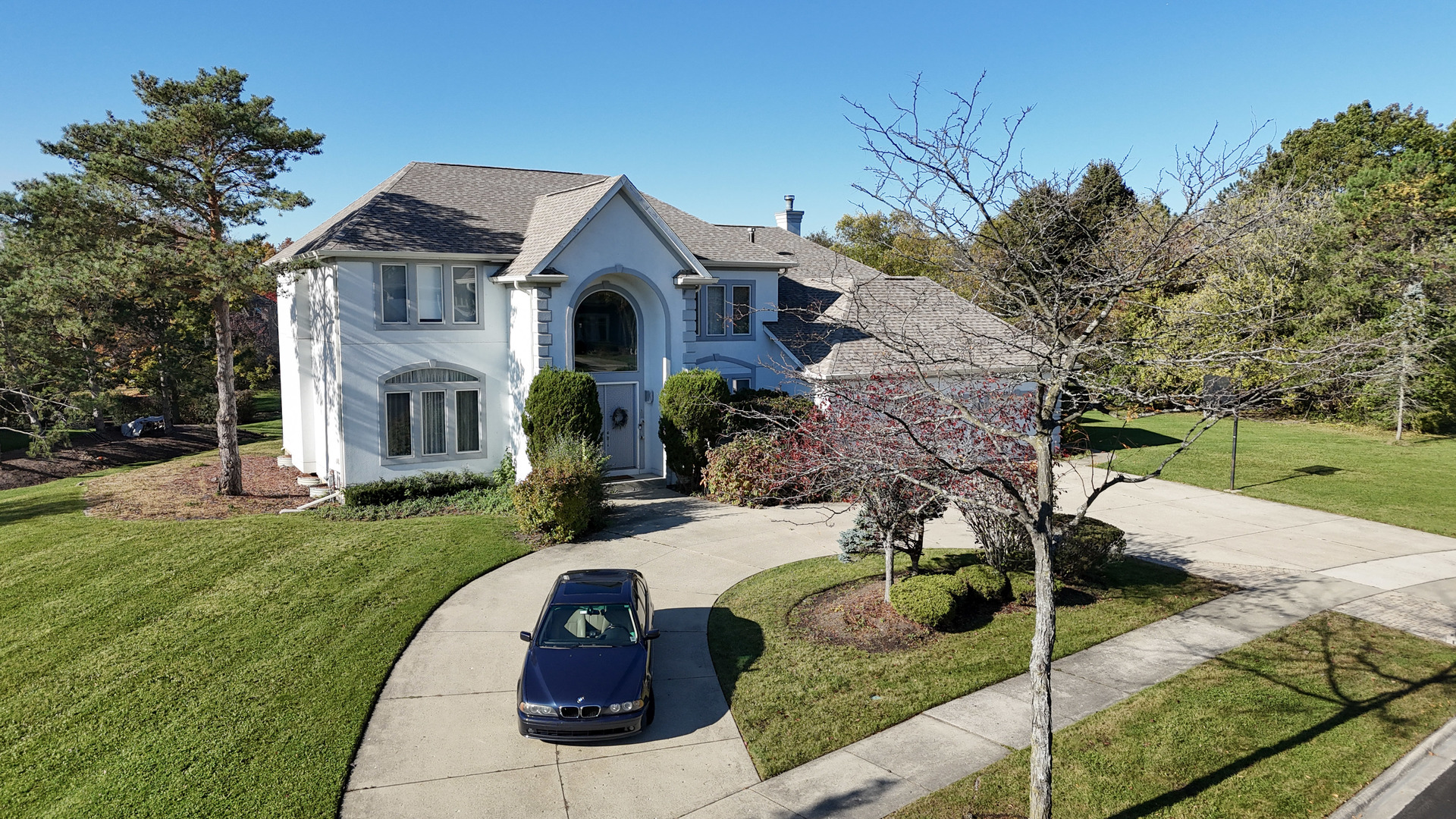 2015 Tree Farm Court Buffalo Grove, IL 60089 - Photo 8 of 100 a front view of a house with a yard