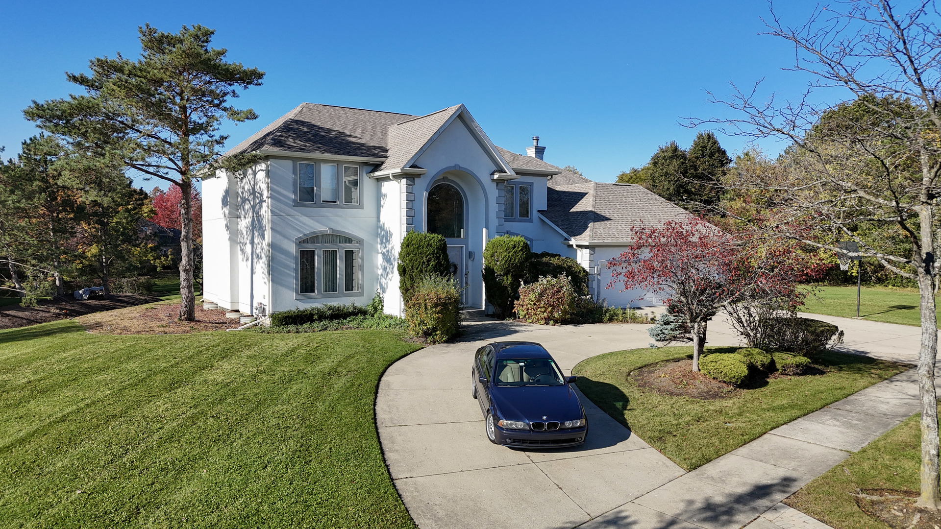 2015 Tree Farm Court Buffalo Grove, IL 60089 - Photo 9 of 100 a front view of a house with garden