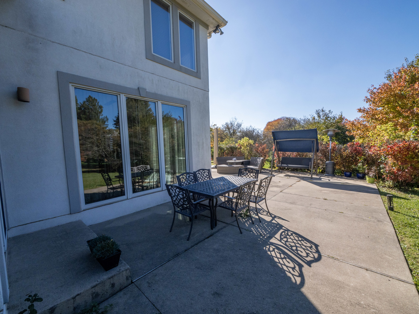 2015 Tree Farm Court Buffalo Grove, IL 60089 - Photo 98 of 100 a backyard of a house with table and chairs