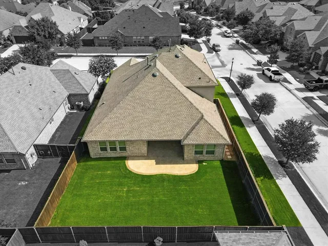 a view of swimming pool with a yard