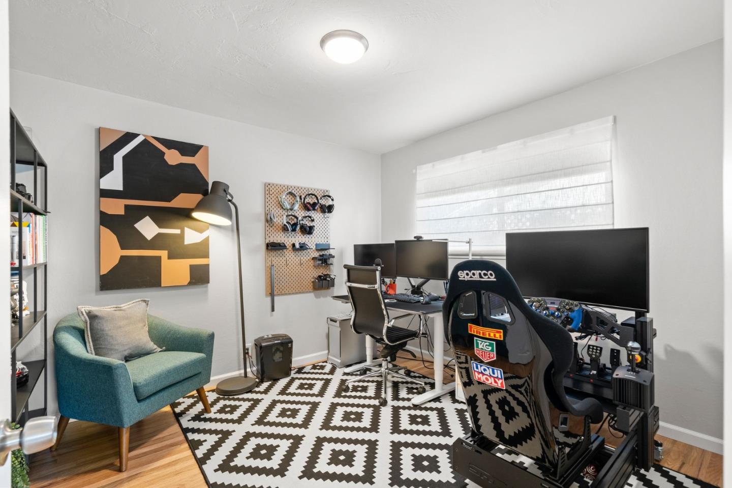5074 Williams Road San Jose, CA 95129 - Photo 15 of 35 a living room with furniture and a flat screen tv